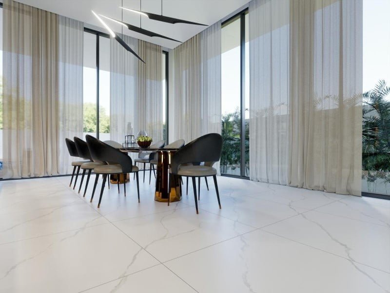 Phòng khách lát gạch vân đá trắng 80x80 tạo ra ít ron gạch nên được lựa chọn phổ biến nhất để mang lại vẻ đẹp sang trọng và hiện đại