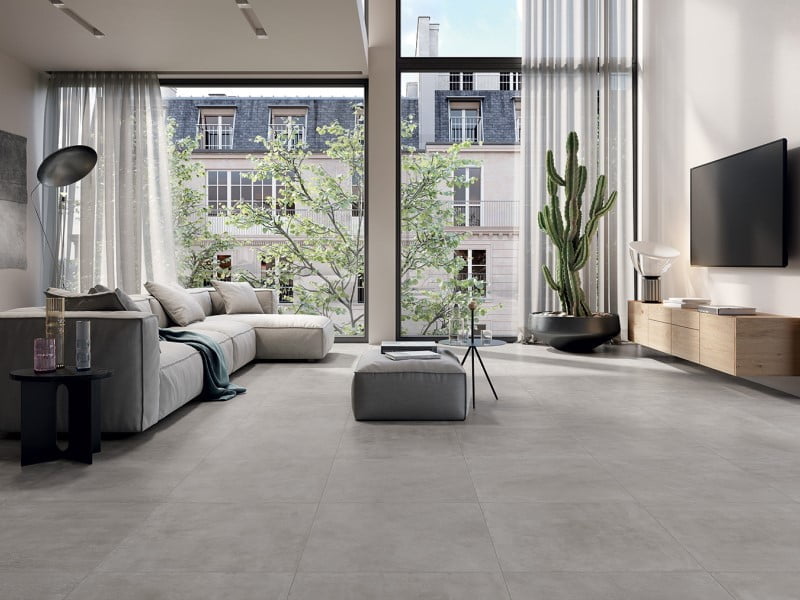 Kết hợp sự đơn giản cổ điển của gạch xi măng 80x80 với đồ nội thất hiện đại, tạo nên không gian phòng khách vừa ấm cúng vừa tinh tế