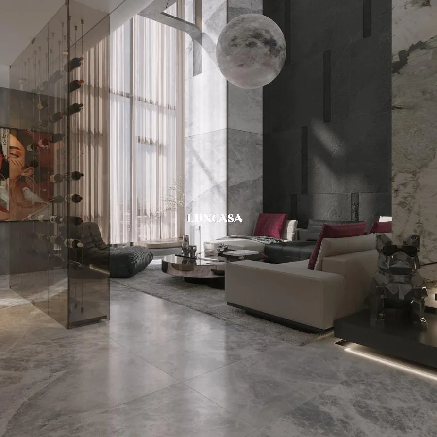 Phòng khách trở nên sang trọng và đẳng cấp với việc sử dụng gạch vân đá xám cao cấp lát sàn, tạo nên vẻ đẹp tinh tế và độc đáo.